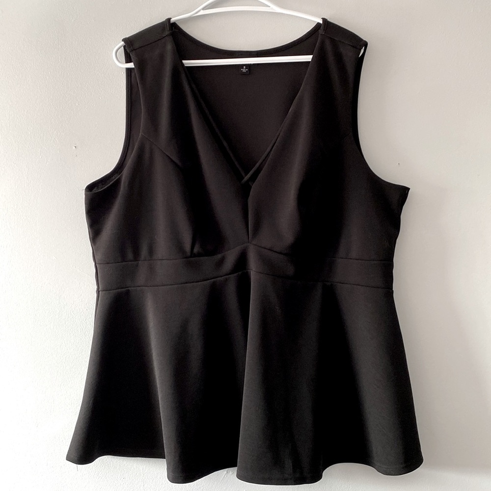 Torrid Peplum Top in Black